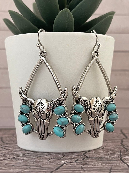 Silver skull drop earrings